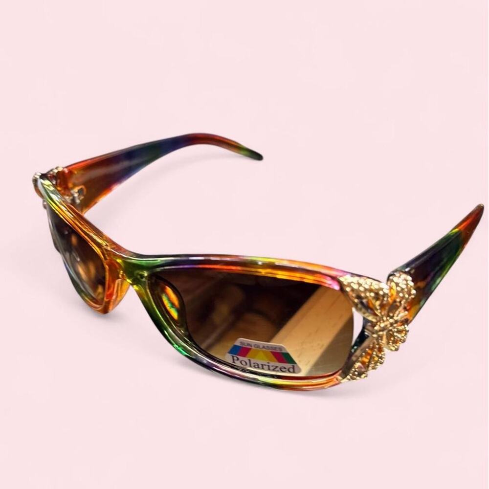 Sunglasses in rainbow with gold butterfly great for pride month! Boho Fairycore
